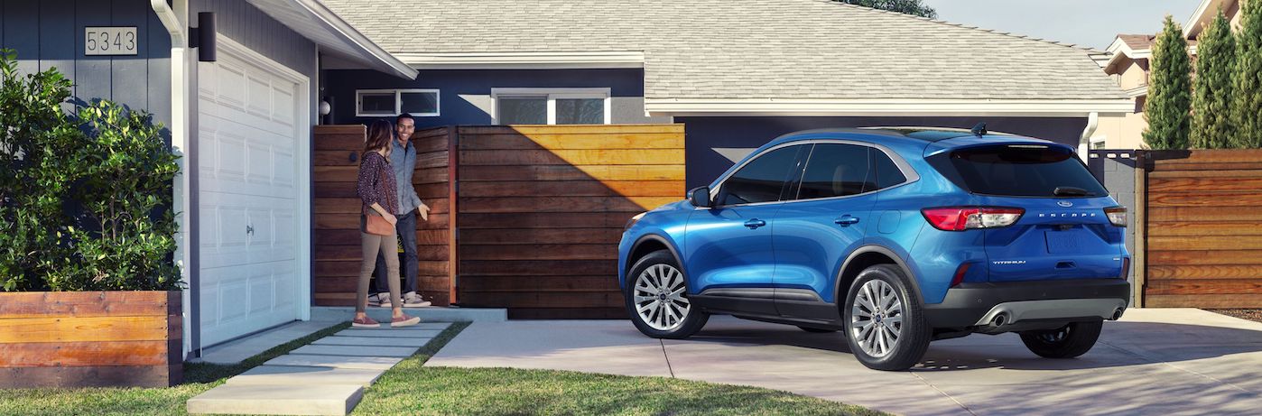 Redesigned 2020 Ford Escape Parked in Front of a House